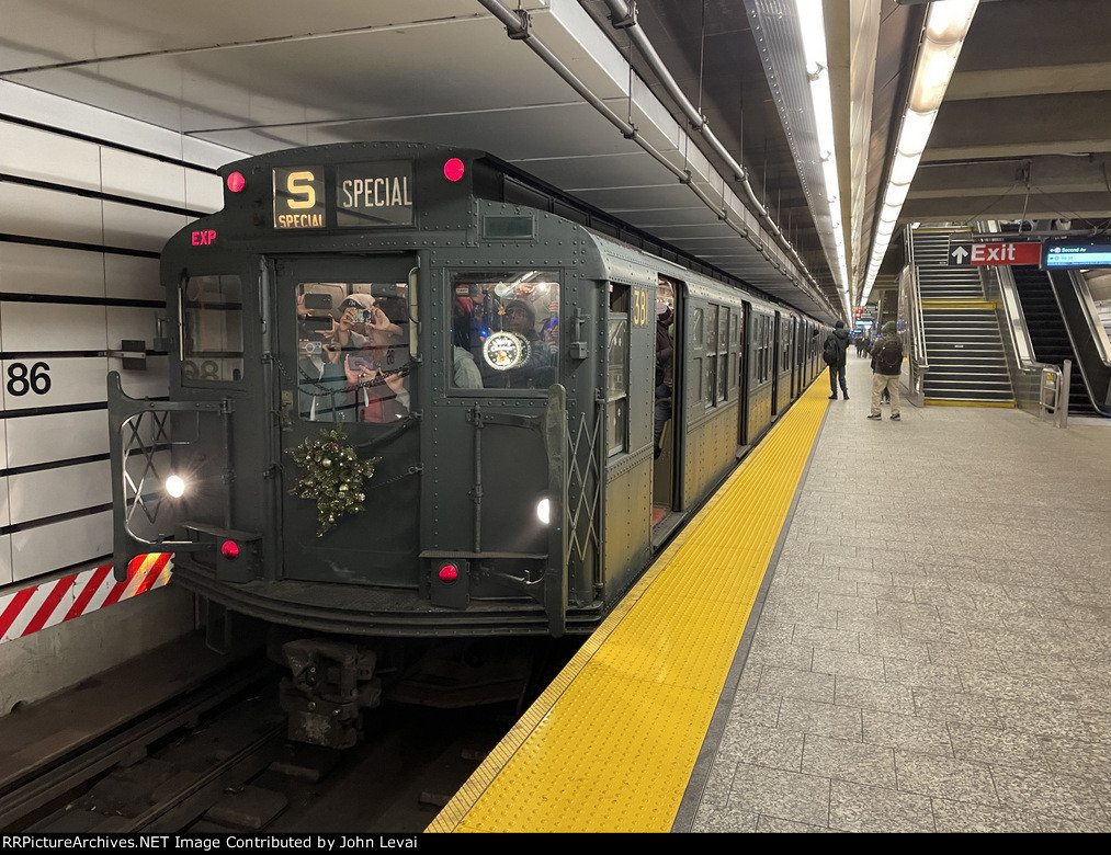 Arnine Car # 381 is on the point of the second NYCTA Holiday Nostalgic Train trip of the day-photo taken at 86th Street Station